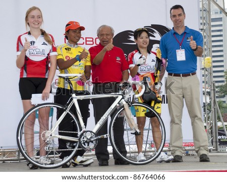 KUALA LUMPUR, MALAYSIA - OCTOBER 16: Winner of The Challenge 52km category at OCBC Cycle Malaysia 2011 giving press conference in Kuala Lumpur, Malaysia on October 16, 2011.