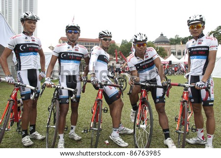KUALA LUMPUR, MALAYSIA - OCTOBER 16: Terengganu Pro Asia team taking part at OCBC Cycle Malaysia 2011 in Kuala Lumpur, Malaysia on October 16, 2011.