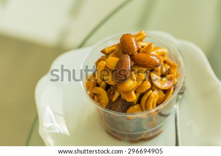 almond and cashews cake in plastic cup