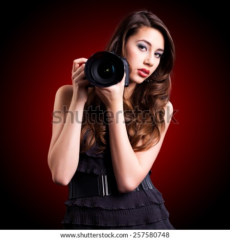 attractive girl with full frame camera