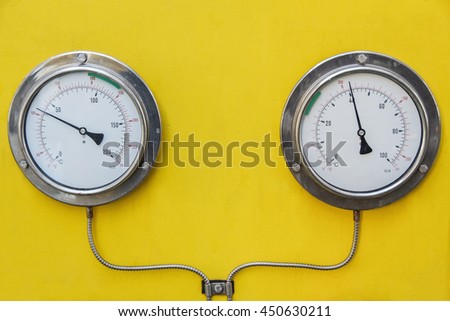 Pressure gauge in oil and gas production process for monitor condition, The gauge for measure in industry job, Industry background and close up gauge , gauge for measure pressure in the process.