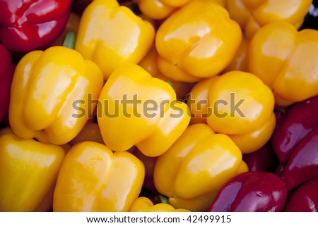 Yellow sweet peppers background