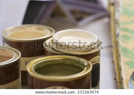 Close-up of tins of paint (differential focus)