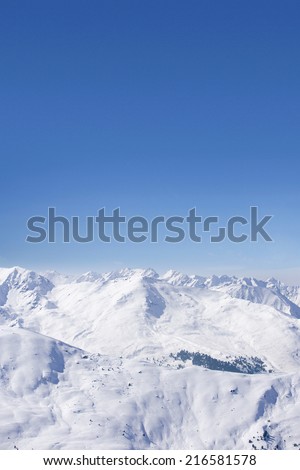 Snowy mountain range and blue sky