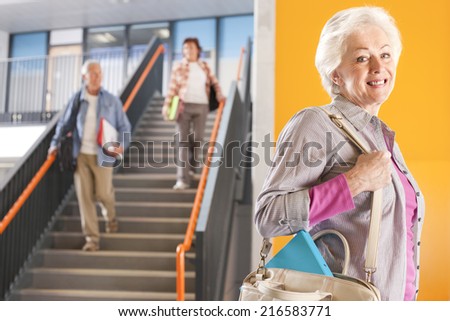Adult students in college arriving for evening classes