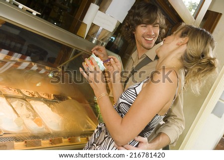 A couple at an ice cream stand