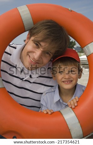 Father and son portrait with life saver