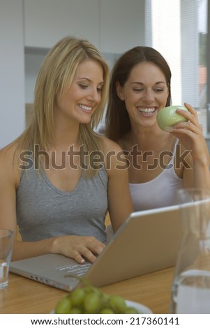 Two women at laptop
