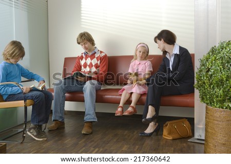 Patients sitting in a waiting room