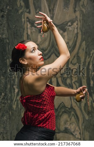 Side profile of a young woman dancing
