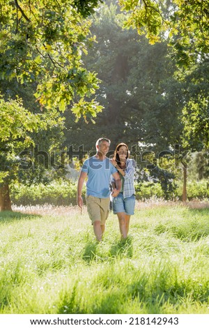Romantic Couple Walking In Beautiful Countryside