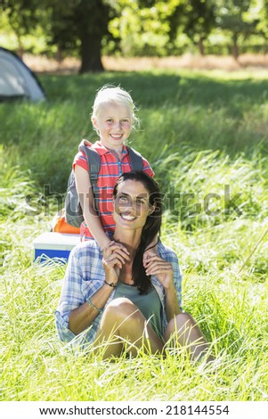 Mother And Daughter Having Fun On Countryside Camping Trip