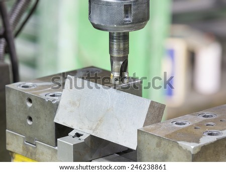 operator grooving steel bar by turning lathe and grooving holder