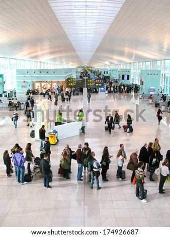 BARCELONA - December 10: Hall of the new, modern airport of Barcelona, with passengers waiting for delayed flights because of a general snow storm in Europe. December 10, 2010, Barcelona, Spain.