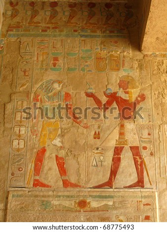 Polychromed carvings of the Pharaoh and God Horus at the awesome Temple of Queen Hatshepsut (1508-1458 BC), between the Valley of Kings and the Valley of Queens, in Luxor (Ancient Thebes), Egypt.