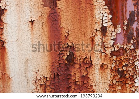 Old rusty metal plate that change from white to red color