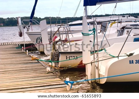 yachts on an anchor in harbor, boats series
