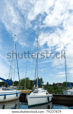 yachts on an anchor in harbor, boats series