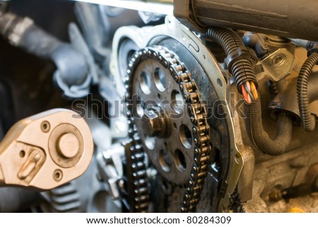 auto parts, auto repair shop, part of a car engine.