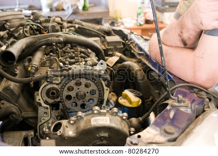 auto parts, auto repair shop, part of a car engine.