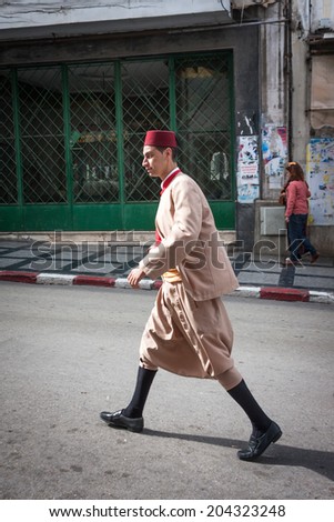 NOVEMBER 3.2013-TANGIER, MOROCCO: In the photo we see a hotel worker with typical Moroccan Minzha suit