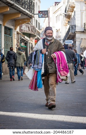 DECEMBER 15,2012-TANGIER, MOROCCO: In the picture we can see a street selling clothes on the streets of the old medina of Tangier