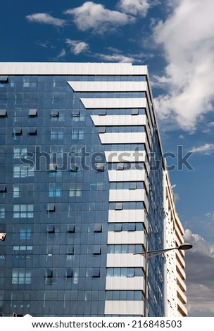 Modern building with sky and clouds