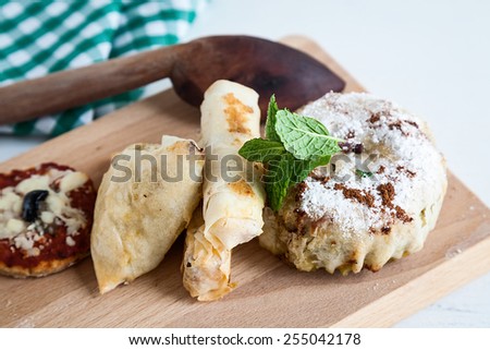 Typical food and fresh Moroccan on wooden table with woven sack