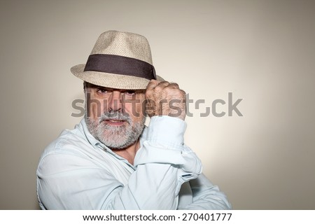 Attractive Senior hat with white beard with hat