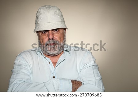 Attractive Senior hat with white beard with hat