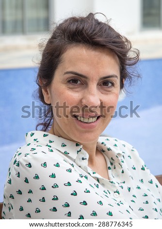 Attractive brunette middle-aged woman