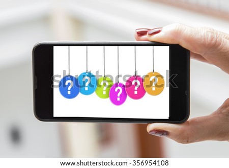 Mobile concept question: woman hands holding a mobile phone screen with a question mark