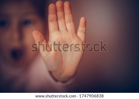 Woman hand sign for stop abusing violence. International human rights or refugee day concept.