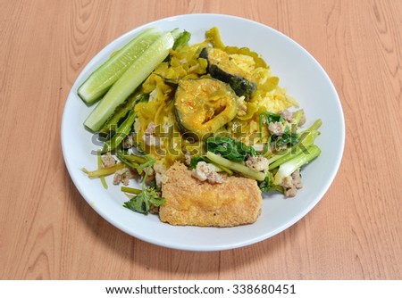 red curry bitter cucumber with catfish and stir-fried egg tofu