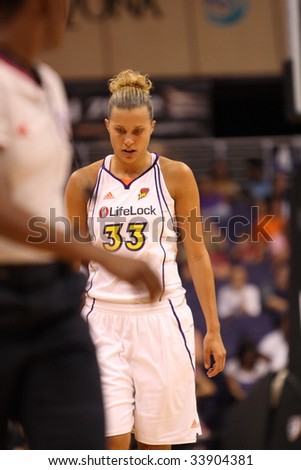 PHOENIX, AZ - JULY 18: Kelly Mazzante (33) concentrates on the task at hand in Saturday nights game between the WNBA Phoenix Mercury and the Detroit Shock on July 18, 2009