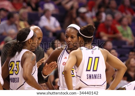 PHOENIX, AZ - JULY 22: Head coach of the WNBA Phoenix Mercury, Corey Gaines talks with the ladies during the 4th quarter of Wednesday nights game against the Minnesota Lynx on July 22, 2009 in Phoenix, Arizona.