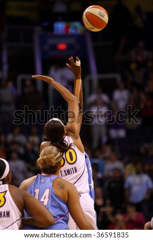 PHOENIX, AZ - SEPTEMBER 5: Tangela Smith (50) of the WNBA Phoenix Mercury fights for a jump-ball during Saturday nights game against the Atlanta Dream on September 5, 2009 in Phoenix, Arizona