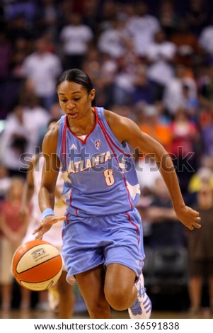 http://image.shutterstock.com/display_pic_with_logo/223840/223840,1252256809,3/stock-photo-phoenix-az-september-iziane-castro-marques-of-the-wnba-atlanta-dream-drives-the-ball-down-36591838.jpg