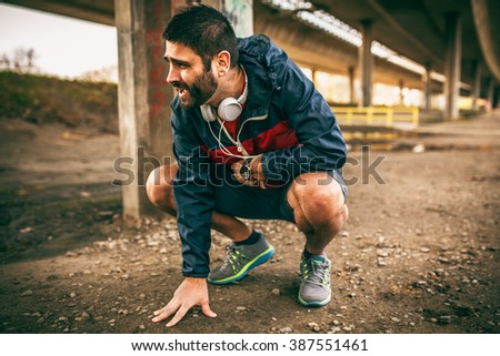 Exhausted man resting after jogging