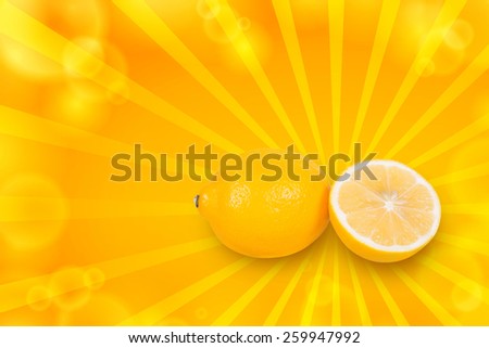 Cut lemon lies near a whole lemon on a white background
