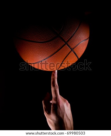 Player Holds a Basketball