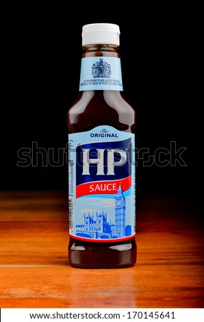 LEEDS, UK - JANUARY 3, 2014: A bottle of HP brown sauce. This sauce is one of the most popular in the UK and is produced by HP foods.