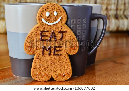 Gingerbread man and coffee cups