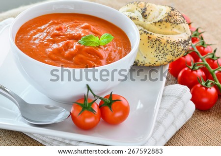 Fresh tomato soup and fresh baked crusty bread rolls.