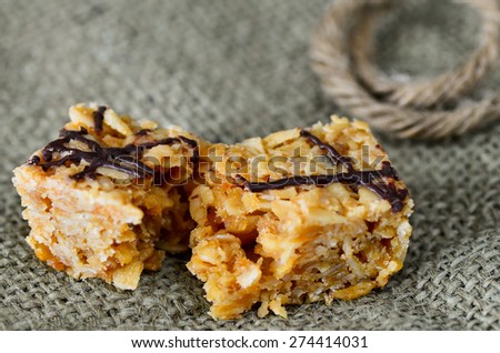 Flapjack snack bar with a chocolate decoration.