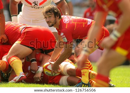 BARCELONA - SEPT, 15: Florian Cazenave of USAP Perpignan in action during the French rugby league match USAP Perpignan vs Stade Toulousain at the Olympic Stadium in Barcelona, on September 15, 2012