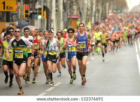 Barcelona - March, 17: Barcelona Street Crowded Of Athletes Running During Barcelona Marathon In Barcelona March 17, 2013 In Barcelona, Spain
