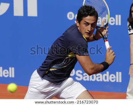 BARCELONA - APRIL, 23: Spanish tennis player Nicolas Almagro in action during a match of Barcelona tennis tournament Conde de Godo on April 23, 2014 in Barcelona