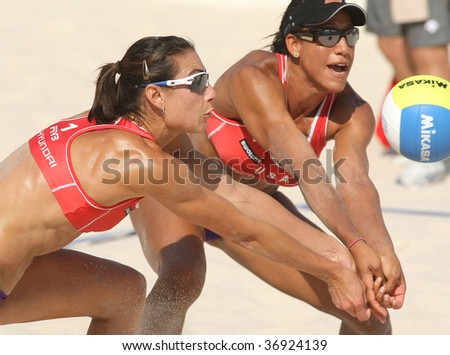 BARCELONA - SEPT. 12: North Americans beach Volley players Akers & Turner in action during a match of the Swatch FIVB Beach Volley World Tour 09 at monjuich September 12, 2009 in Barcelona, Spain.