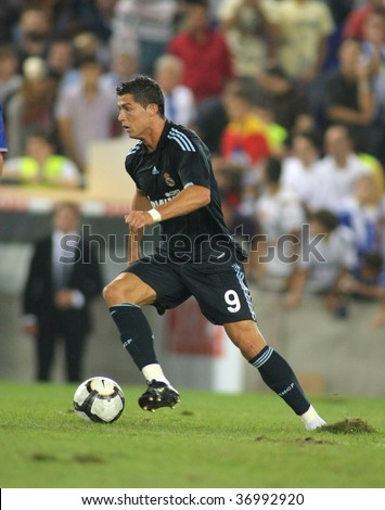 BARCELONA SEPT 12 Cristiano Ronaldo of Real Madrid in action during a Spanish League match against RCD Espanyol at the Estadi Cornella-El Prat on September 12 2009 in Barcelona Spain BARCELONA SEPT 12 Cristiano Ronaldo of Real Madrid in action during a Spanish League match against RCD Espanyol at the Estadi Cornella-El Prat on September 12 2009 in Barcelona Spain
